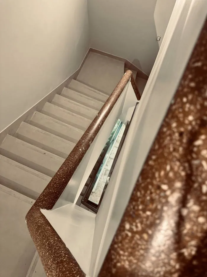 Cabina de masajes de Spa Belgrano con camilla y decoración zen